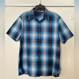 This is a Perry Ellis designer, brand shirt, size large, slim fit. Like new.